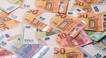 Paper money, euro notes, cash for savings and investments. Euro paper cash