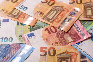 Paper money, euro notes, cash for savings and investments. Euro paper cash