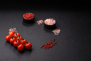 Ingredients for cooking cherry tomatoes, salt, spices and herbs
