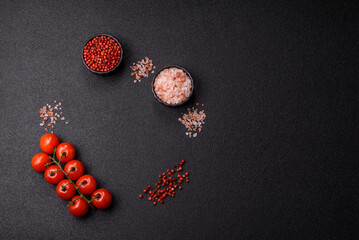 Ingredients for cooking cherry tomatoes, salt, spices and herbs