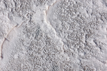 Top-down view of  large areas of salt that have appeared on the surface of a dried-up lake in Kalmykia, Russia. Salt flats in Kalmykia