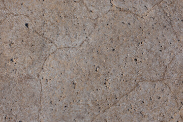 Top-down view of deserted terrain with white dried salt spots. Dry cracked land covered with salt. Kalmykia, Russia