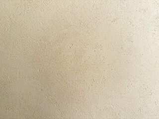 Golden venetian plaster wall texture background, abstract metallic decorative surface with luxury shine, seamless stucco design for elegant interiors and creative design use.