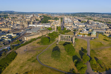 Fototapeta premium Aerial image of Calton Hill and the surrounding cityscape in Edinburgh - Scotland. 