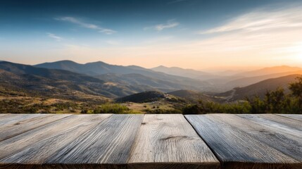 Ultra quality image of wooden table with mountain background. Blurry view of hills, sky and clouds at sunset. Nature landscape with copy space for product display or advertising.