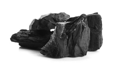 Pieces of black coals isolated on white