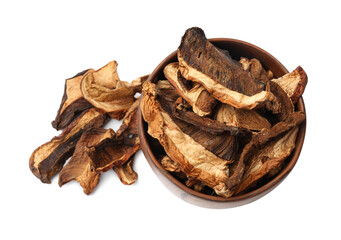 Pieces of dried mushrooms in bowl isolated on white, top view