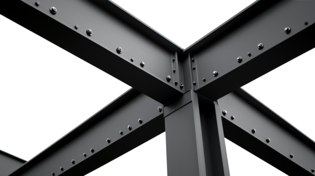 Close-up of a steel framework joint with rivets, showcasing industrial construction and structural engineering details against a dark background.