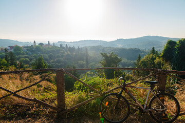 Bicycle Overlooking Sunlit Valley