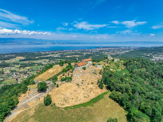 Aerial view of Allinges castle a medieval ruin and a castle with bastions on the hill above the Lake Geneva in France