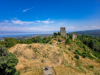 Aerial view of Allinges castle a medieval ruin and a castle with bastions on the hill above the Lake Geneva in France