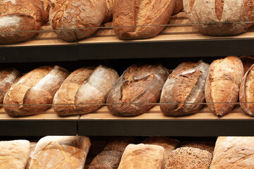 shelves with traditional rye and wheat bread