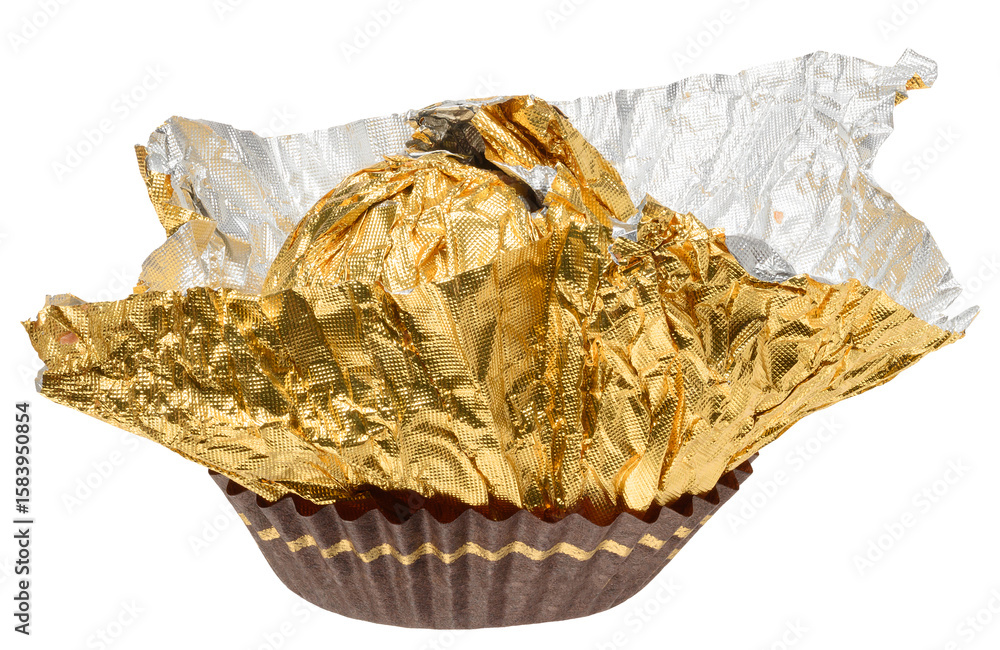 Poster empty golden foil wrapper from round candy, partially unfolded and placed in brown paper form, isola