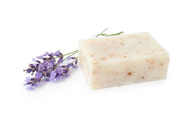 Soap bar and lavender flowers isolated on white