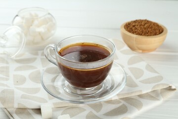 Aromatic instant coffee on light table, closeup