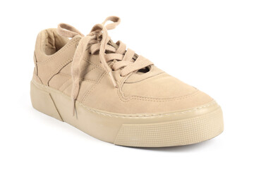 One stylish beige sneaker on white background