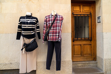 Clothes sell on the street in tourist destinations. Potential buyers flock during the tourist...