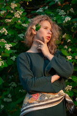 Girl in bushes bloom