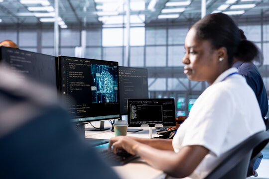 Server farm employee using AI systems on PC to input data faster during complex computational tasks. Computer scientist in data center using artificial intelligence parallel processing tech