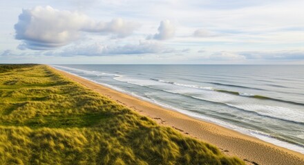 Serene coastal landscape showcasing a sandy beach, rolling waves, and verdant dunes under a partly cloudy sky.