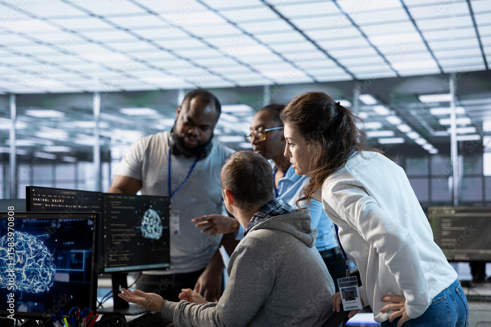 Aufkleber engineer doing brainstorming with colleagues to fix error in code affecting server room ai workloads