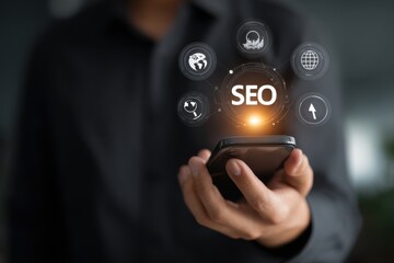Search engine optimize. man use mobile phone, on virtual screen with SEO icon for analysis SEO Search Engine optimizing your website traffic to rank in search engines SEO. Promoting ranking of world.