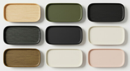 Collection flat lay of rectangular minimalist serving trays in various natural and muted colors, isolated on white background - modern home and kitchen decor concept