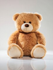 Obraz premium Fluffy cute teddy bear toy sitting ground paws resting white background product photography studio lighting centered composition soft shadows high resolution intricate details