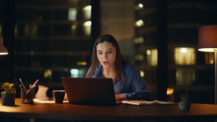 Video calling executive complaining on documentation mistake at night office. 