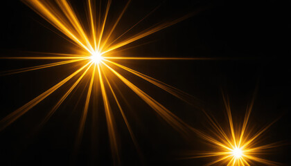 Two bright, golden starbursts radiating light against a dark background.