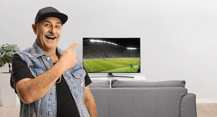Sports fan watching a football match