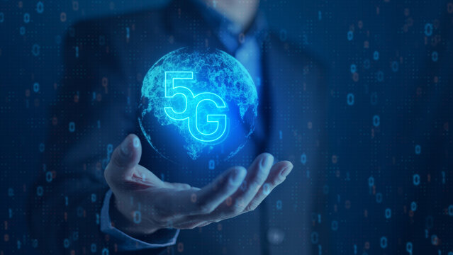 business hand holding 5g symbol with world icon