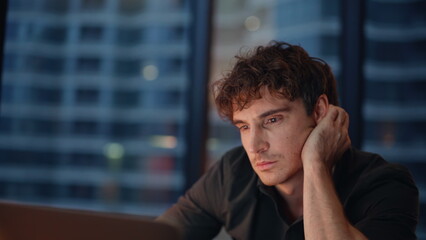 Woman manager checking trainee working late at office laptop worried closeup. 