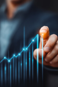 Planning and strategy, Stock market, Business growth, progress or success concept. Businessman or trader is showing a growing virtual hologram stock, invest in trading. Height return.
