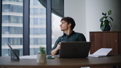 Company professional thinking project sitting modern workplace holding pencil.