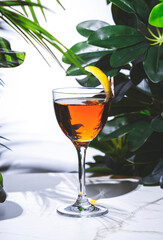 La Perla alcoholic cocktail drink with tequila, manzanilla sherry, pear liqueur, lemon peel
