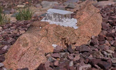 Plaster Model deteriorating on a rock. Object has no identifiable marks. No property release needed.