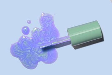 Cosmetic beauty product. Nail polish purple lilac and green blue shimmer holographic stein splash with green cape brush on blue background