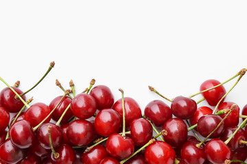 Fresh ripe cherries on white background, flat lay. Space for text