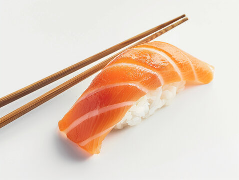 Pieza de sushi nigiri con palitos sobre fondo blanco