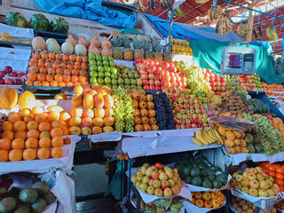 Display of a wide variety of fresh fruits ready to be sold at a market in the city of Arequipa,...
