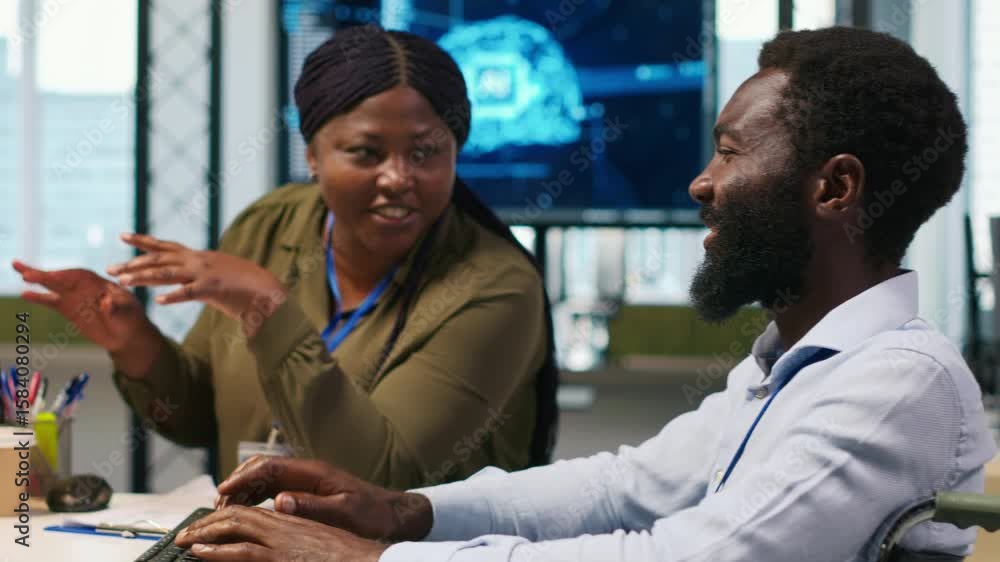 Fototapete joyous technician with disability and coworker chatting while coding ai algorithms debugging softwar