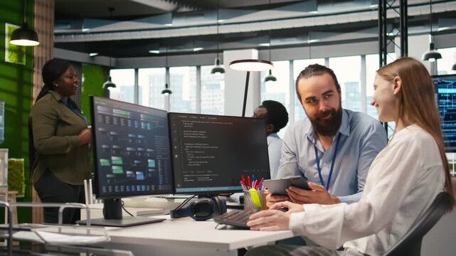 Mentor teaching young employee to troubleshoot software errors using AI. Manager doing induction to newcomer junior dev using computer to write code, developing machine learning APIs, camera A