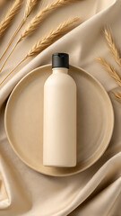Elegant Product Presentation with Neutral Tones A Bottle on a Plate with Wheat and Fabric Accents