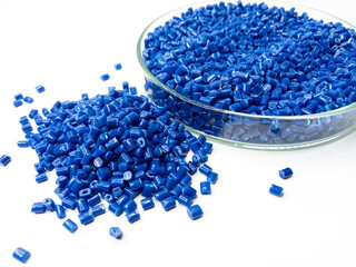 Plastic masterbatch, masterbatch granules, polymer carrying pigment poured into a glass cup forming...