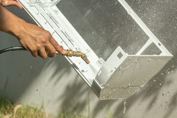 air conditioning cleaning service with water spray