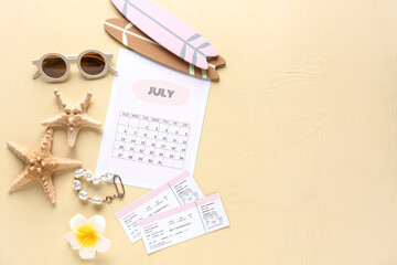 Calendar with tickets, sunglasses and beach decor on light yellow grunge background. Summer...