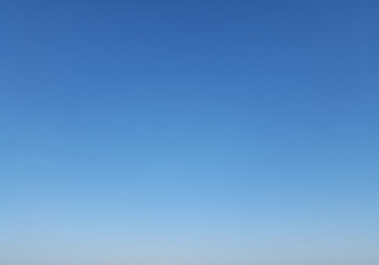 Serene Blue Sky Gradient A Seamless Atmospheric Canvas for Design and Creative Projects with a sense of vastness.