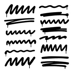 Collection of black spray paint graffiti marks with drips and rough texture
