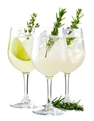 Three refreshing cocktails garnished with herbs and lime slices, isolated on transparent background.